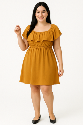 Plus size woman wearing a yellow flutter sleeve mini dress with elastic waist and ruffle detail